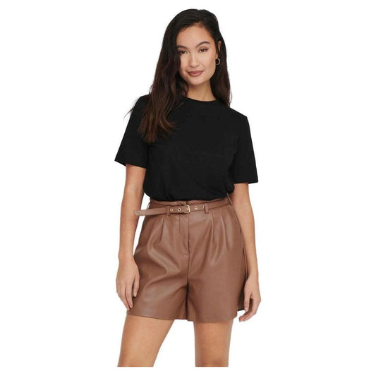Woman wearing a black cotton T-shirt from the spring/summer collection, paired with brown shorts, showcasing casual style.
