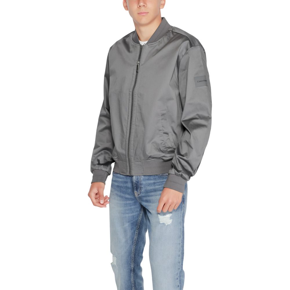 Calvin Klein Gray Organic Cotton Bomber jacket on model, showcasing modern and minimalist style.