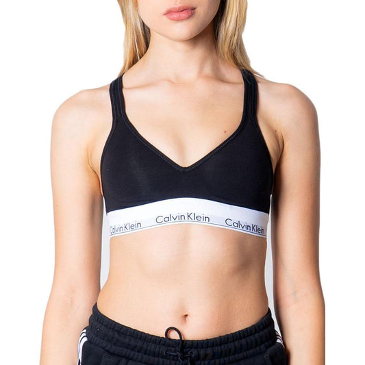 Calvin Klein black polyester bralette with logo band, offering comfort and support for everyday wear, ideal for a minimalist style.