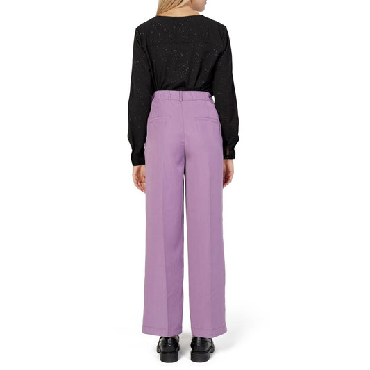 Back view of woman wearing Street One Purple Lyocell Fall/Winter jeans, showcasing comfortable fit and stylish design.