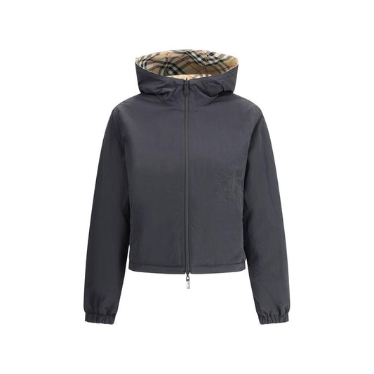 Burberry reversible jacket with adjustable drawstring hood and iconic Check Archivio pattern, featuring elasticized cuffs and zippered pockets.