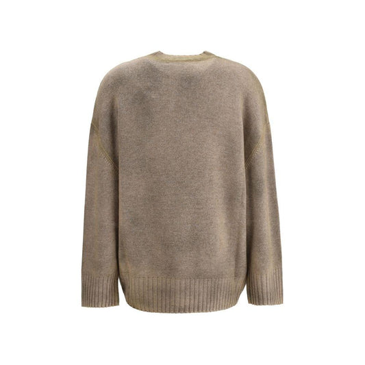 The Attico wool sweater with ribbed neck and cuffs, asymmetrical hem, and iconic logo, showcasing a loose fit in monochrome pattern.