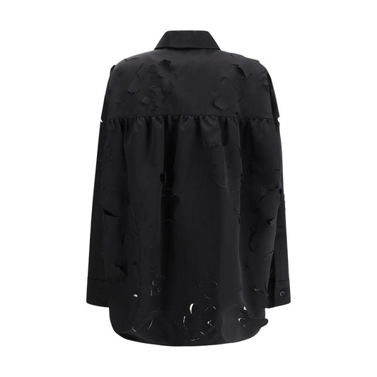 Marni shirt with classic collar, button front, adjustable cuffs, all-over flower cut-outs in a monochrome pattern, rear view.