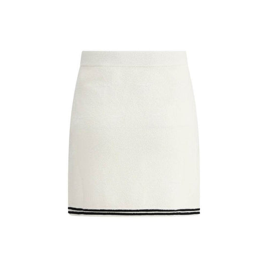 Self-Portrait midi skirt with elastic waistband, jacquard bow design, and contrasting hemline.