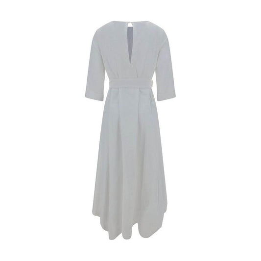 Ella Long Dress back view, featuring cotton fabric, boat neckline, three-quarter sleeves, smocked waist, bow tie, and embroidered hem.