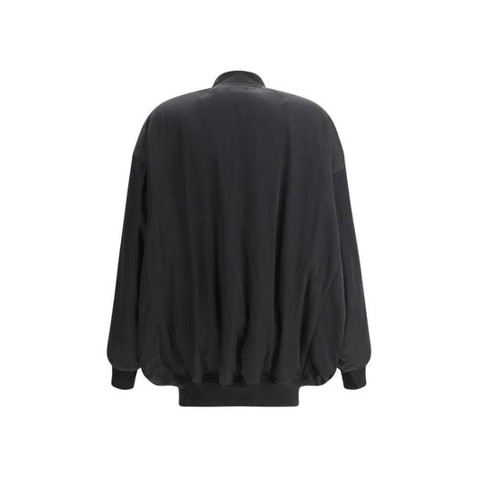 Back view of Rick Owens Bomber Jacket in black featuring ribbed cuffs and hem, showcasing its urban and sophisticated style.