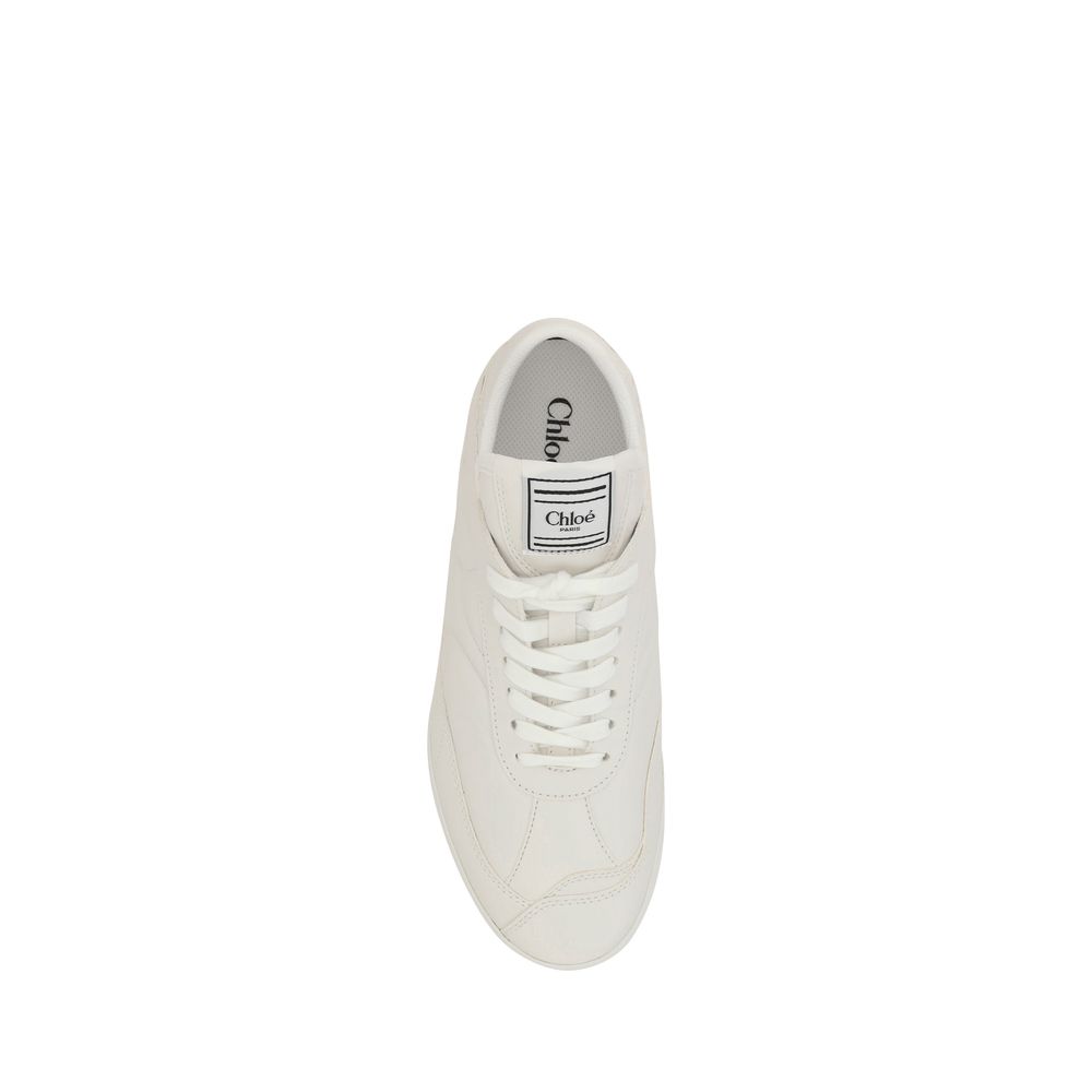 Chloé White Calf Leather Bos Taurus Low Top Sneakers with flat sole and lace-up closure, featuring iconic logo patch on the tongue.