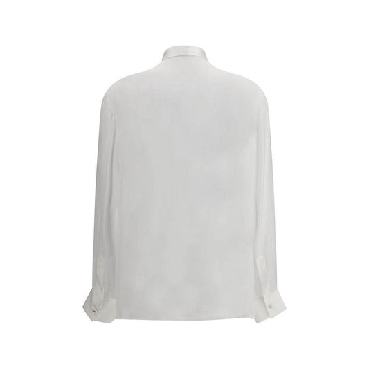 Back view of Dolce & Gabbana silk chiffon shirt in white, featuring a semi-transparent design with elegant cuffs.