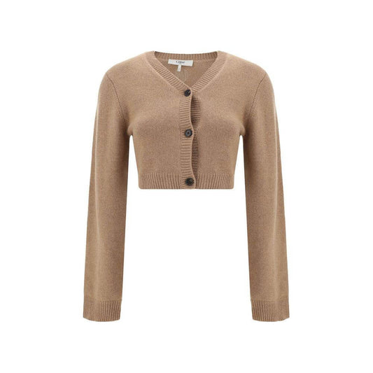 Chloé cashmere cropped sweater with ribbed crew neck and contrasting buttons, featuring ribbed cuffs and hem in a monochrome pattern.