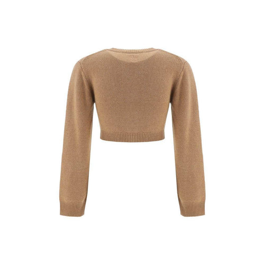 Back view of Chloé cashmere cropped cardigan, showcasing ribbed crew neck and monochrome design with ribbed cuffs and hem.