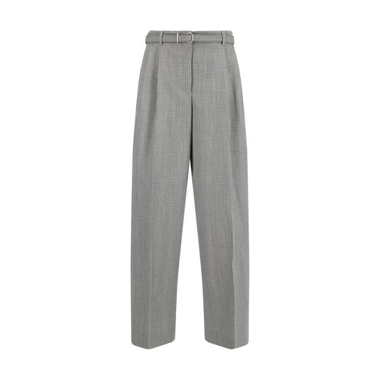 Jil Sander virgin wool wide-leg pants with belt, featuring button-and-zip closure, side slash pockets, and adjustable fit.