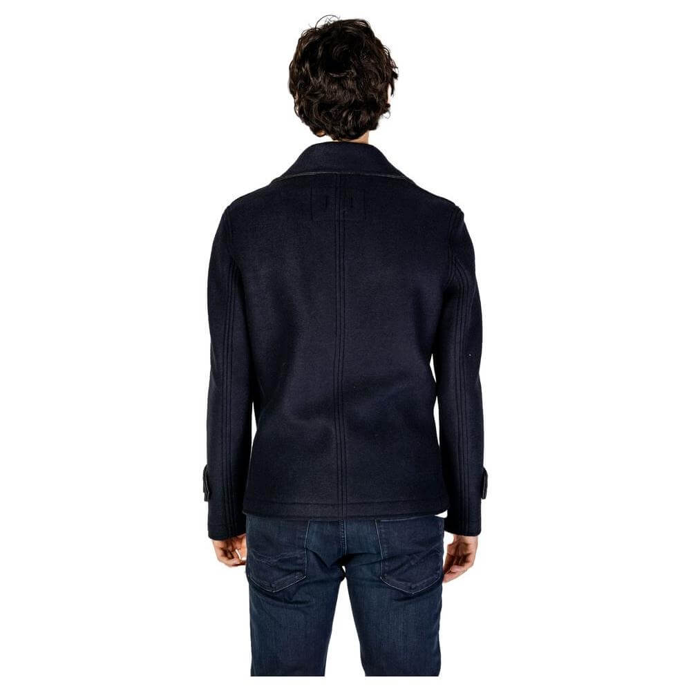 Front view with bag zipped and handles upright.