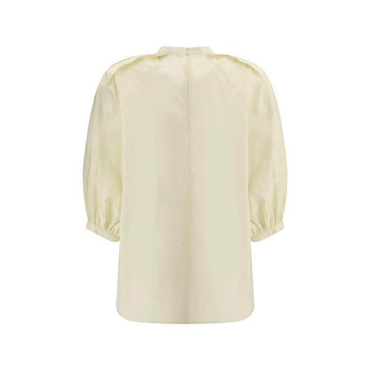 Elegant Fabiana Filippi balloon sleeves blouse made from soft cotton with high neck and back zipper, showcasing sophisticated design.