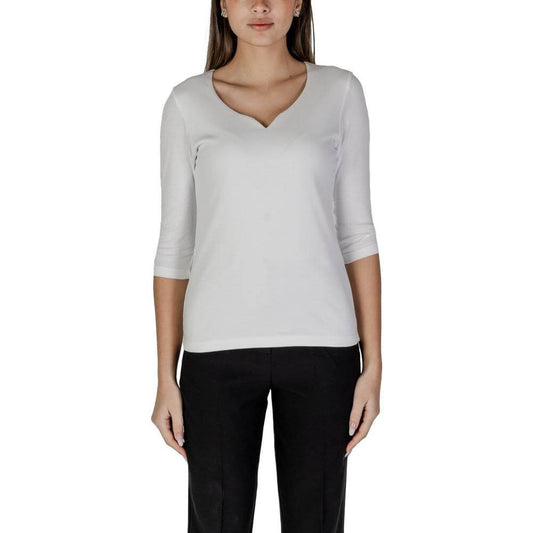 Woman wearing a Street One white cotton modal blend short-sleeved T-shirt, part of the spring/summer collection.