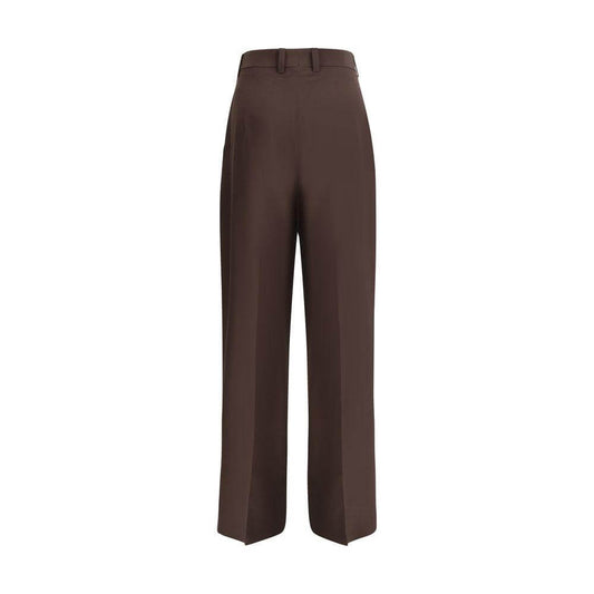 Petar Petrov high-waisted silk pants with wide-leg silhouette, hidden front zipper, hook closure, and side welt pockets.