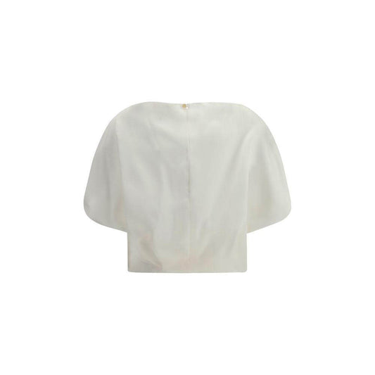 Khaite Niles Silk Top with boat neckline, monochrome pattern, pleat detail, and keyhole back button closure, rear view.