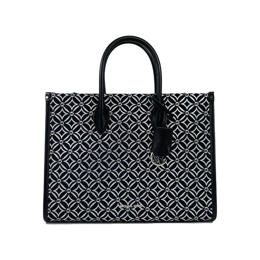 Michael Kors Mirella Medium Black Crossbody Tote Bag with geometric pattern, leather handles, adjustable strap, and top zip closure.