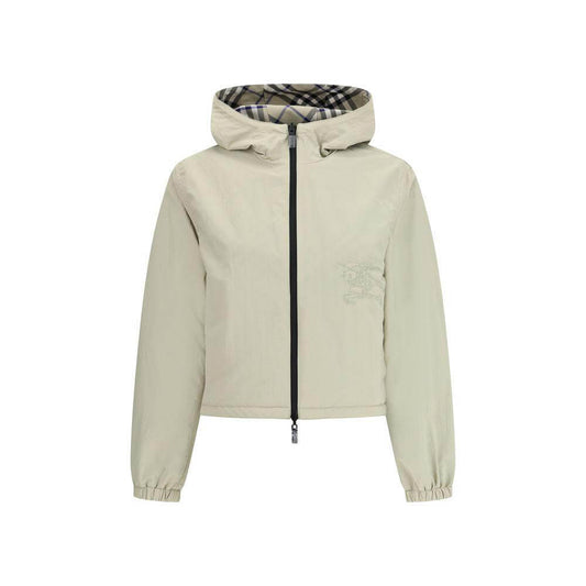 Burberry reversible jacket with adjustable hood, featuring monochrome and Check Archivio patterns, elastic cuffs, and zippered pockets.