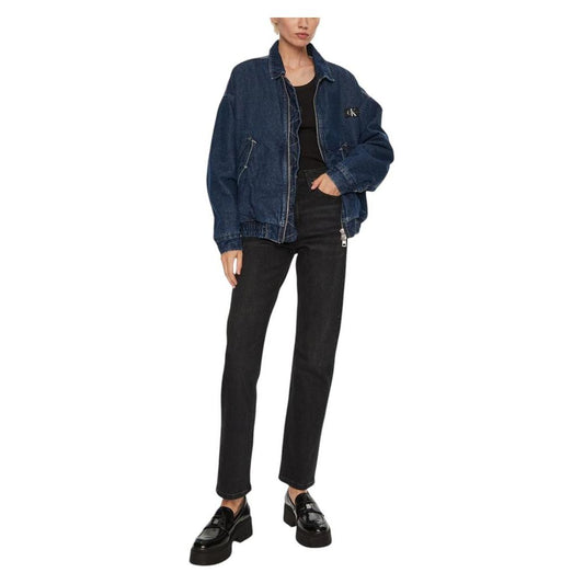 Woman wearing Calvin Klein black cotton high-rise straight jeans with denim jacket