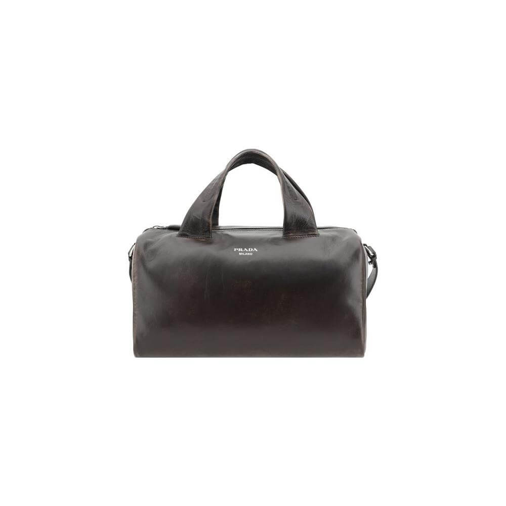 Front view with bag zipped and handles upright.