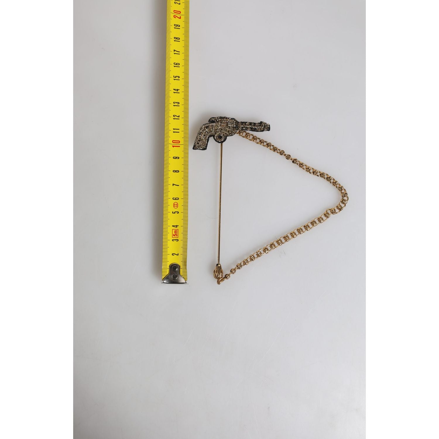 Dolce & Gabbana Black Gold Brass Copper Revolver Brooch Lapel Pin