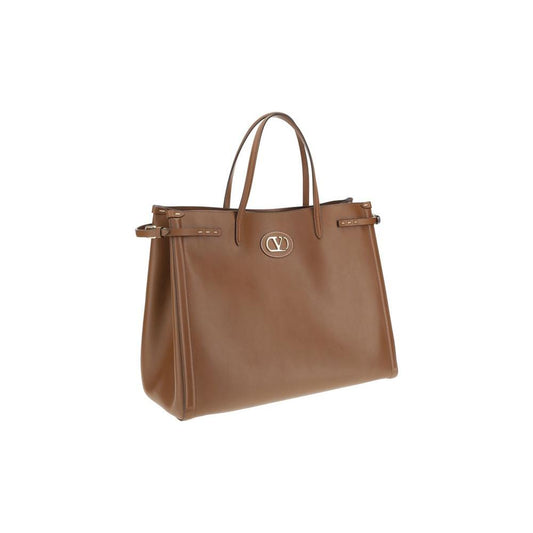 Valentino Garavani Large Antibes Tote Bag with leather VLogo, gold accents, and double handles, in brown high-quality leather.