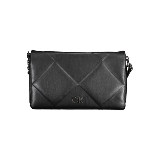 Calvin Klein black polyester handbag with adjustable shoulder strap, two compartments, internal pocket, and logo detail.