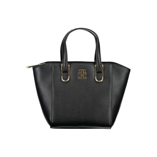 Tommy Hilfiger black handbag with logo, two handles, zip closure, and adjustable shoulder strap