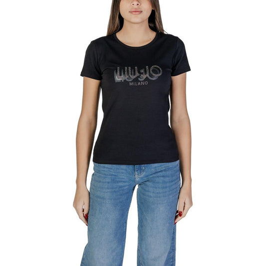 Woman wearing Liu Jo black short-sleeved cotton T-shirt from the Spring/Summer collection, featuring elegant design and comfortable fit.