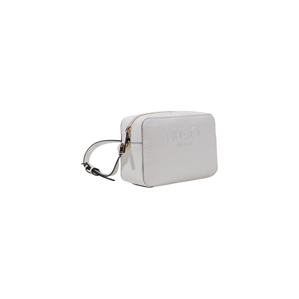 Front view with bag zipped and handles upright.