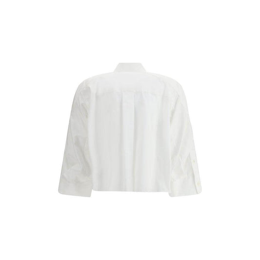 Back view of Sacai three-quarter sleeve cotton shirt with wide cuffs and classic collar, showcasing its contemporary and casual design.
