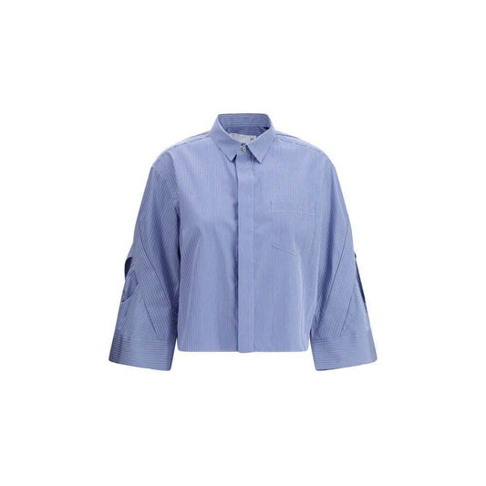 Sacai three-quarter sleeve cotton shirt with classic collar and wide cuffs, featuring a casual loose fit and applied welt breast pocket.