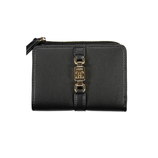 Tommy Hilfiger sleek black zip wallet with coin purse, featuring gold logo detail, made from recycled polyester for style and practicality.