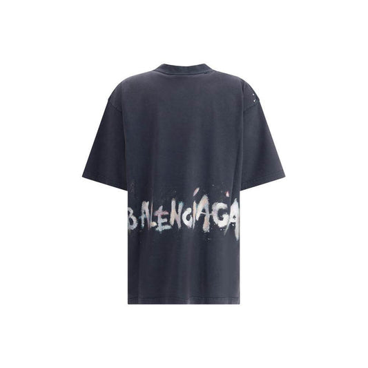 Balenciaga oversized T-shirt with vintage-style, ribbed neck, embroidered logo, and glitter monogram on the back for a modern look.