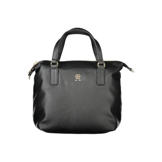 Tommy Hilfiger black polyester women's handbag with logo, adjustable strap, zip closure, and two handles for chic, versatile style.