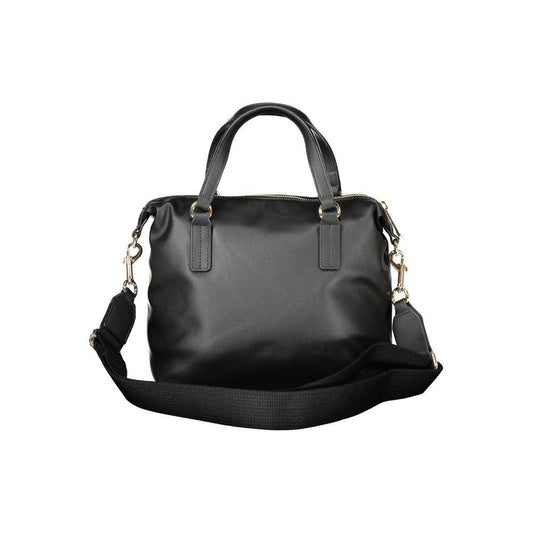 Tommy Hilfiger black polyester women's handbag with detachable strap and internal pocket, featuring iconic branding.