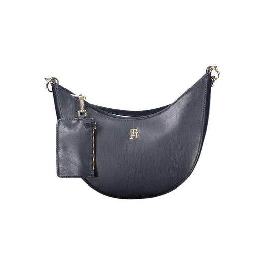 Tommy Hilfiger blue polyethylene women's handbag with detachable coin purse and adjustable strap, featuring a secure zip closure.