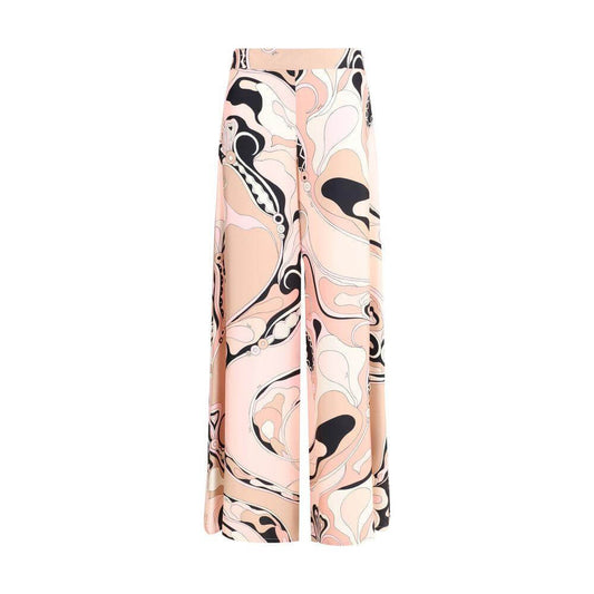 Emilio Pucci orchid print silk pants with wide leg, vibrant floral design, perfect for a chic summer look.