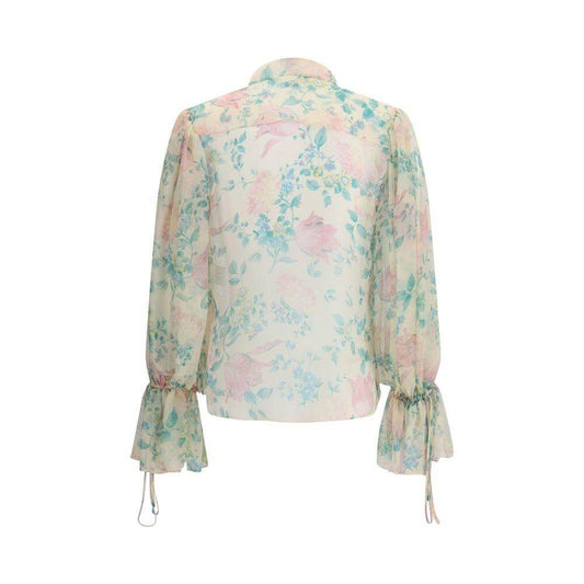 Chloé silk muslin sheer blouse with peony print, featuring mandarin collar and gathered cuffs, back view.