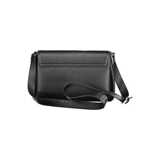 Calvin Klein black polyester women's handbag with adjustable shoulder strap and internal pocket, featuring iconic logo and sleek design.
