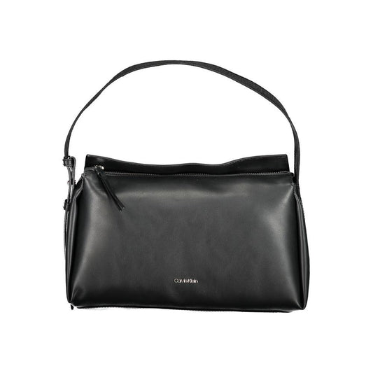 Calvin Klein black polyester handbag with adjustable shoulder strap, zip closure, internal pocket, and contrasting details.