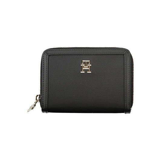 Tommy Hilfiger elegant zip wallet with ample storage, featuring iconic logo, secure zip closure, and five compartments for organization.