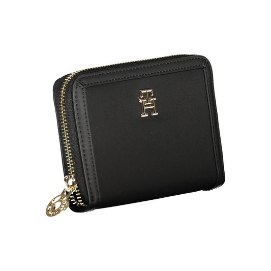 Tommy Hilfiger elegant zip wallet with compartments and coin purse, featuring secure closure and iconic logo, black color.