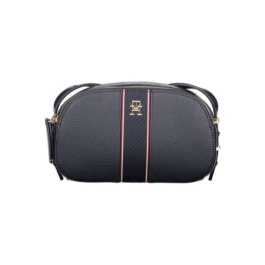 Tommy Hilfiger blue women's handbag with adjustable shoulder strap and embossed logo, featuring two compartments and sleek design.