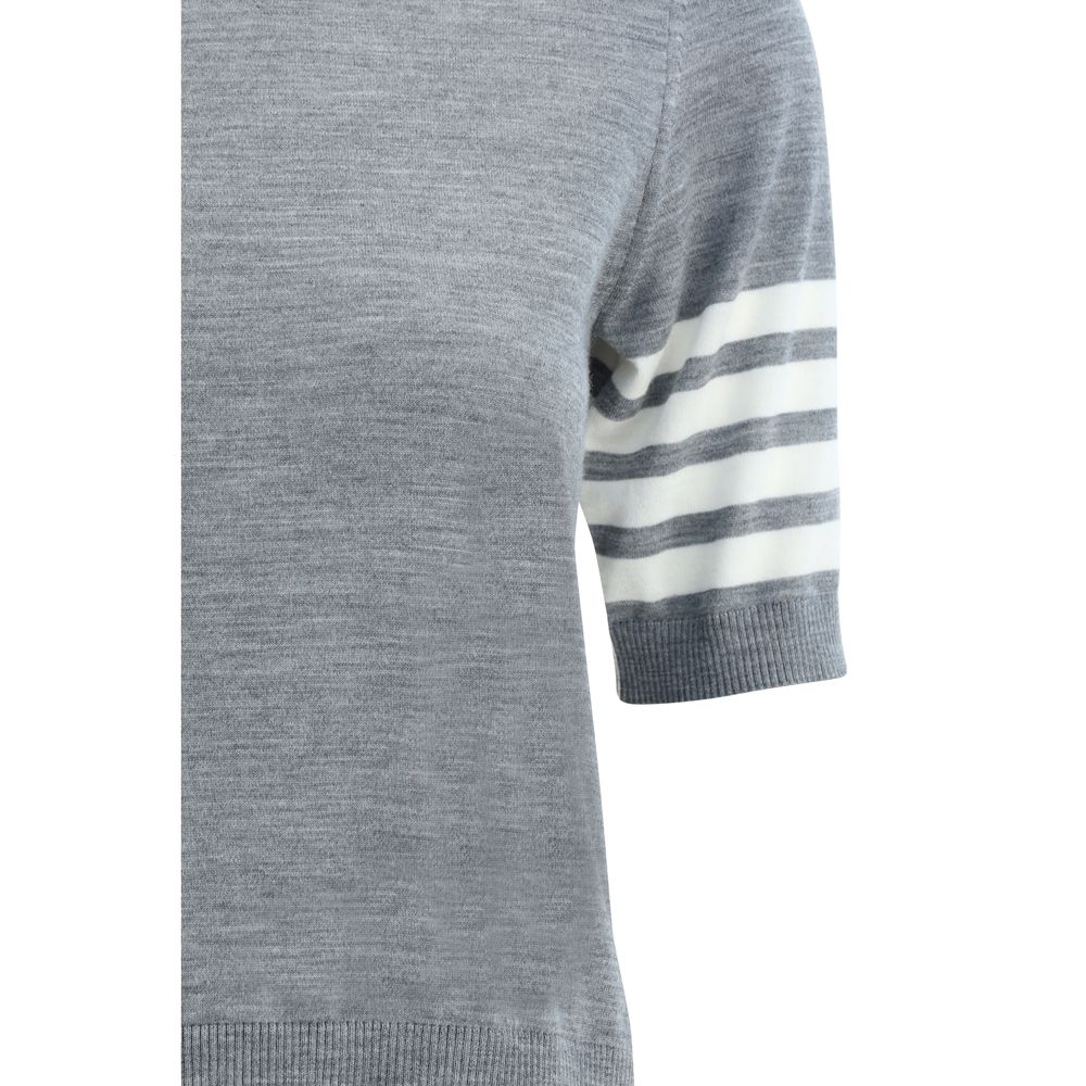 Thom Browne Turtleneck Sweater with ribbed fabric, short sleeves, and iconic bands on sleeve, showcasing monochrome pattern and contrasting hems.