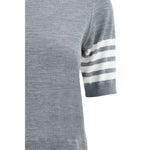 Thom Browne Turtleneck Sweater with ribbed fabric, short sleeves, and iconic bands on sleeve, showcasing monochrome pattern and contrasting hems.