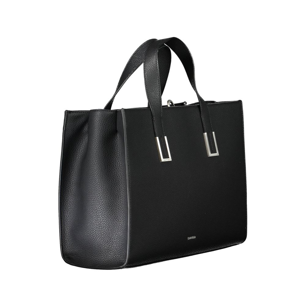 Front view with bag zipped and handles upright.