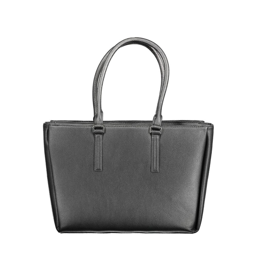 Front view with bag zipped and handles upright.