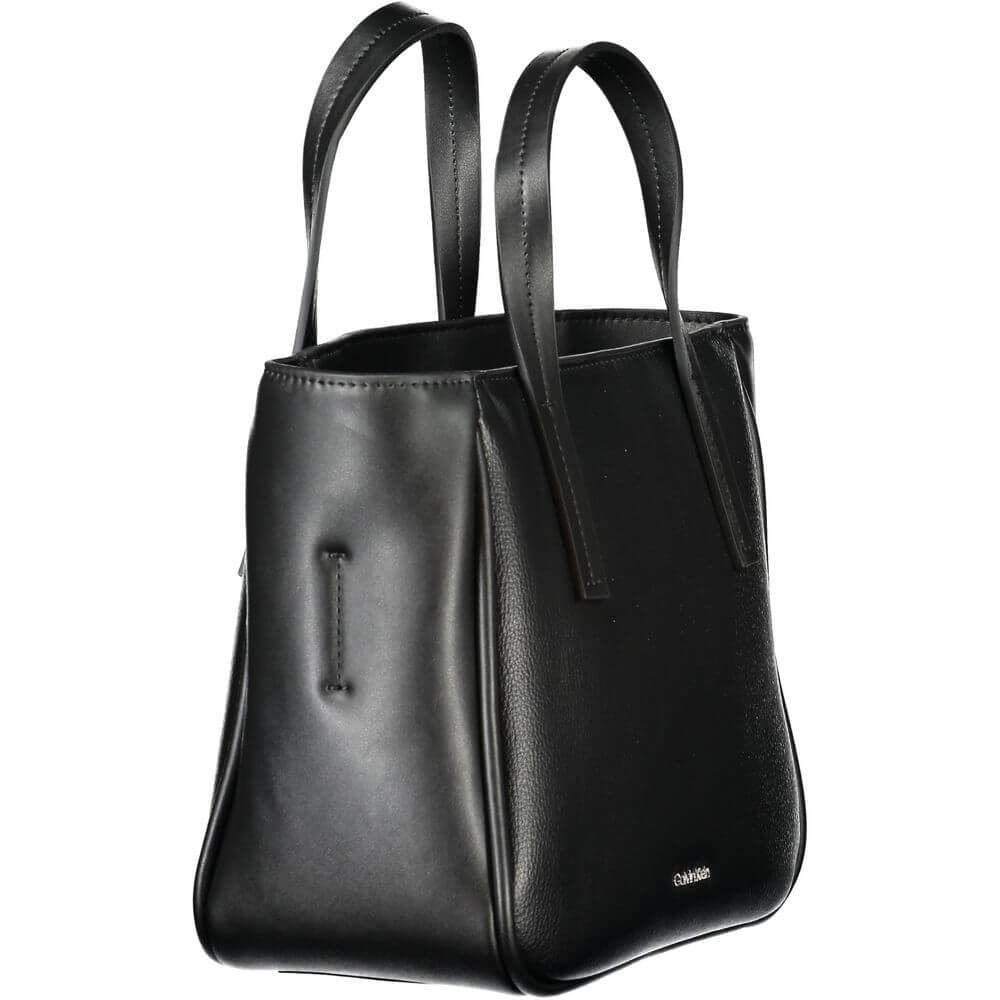 Front view with bag zipped and handles upright.