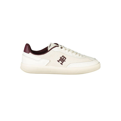 Tommy Hilfiger Beige Leather Women Sneaker with brown accents and iconic embroidery logo, perfect blend of style and comfort.